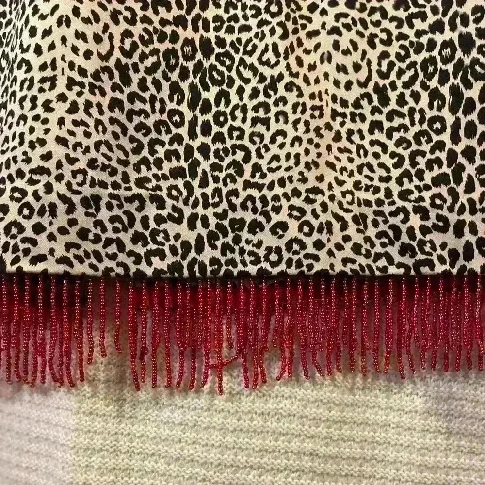 Bliss pencil skirt in animal print with red trim.